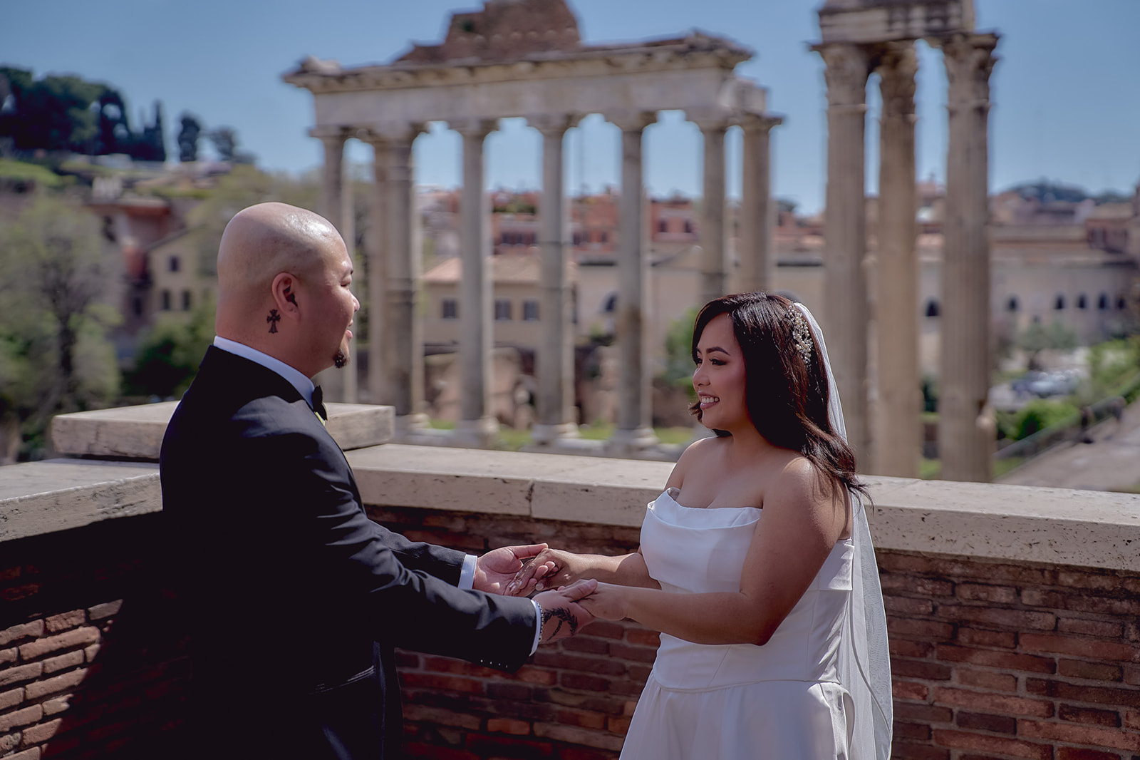 Bride and groom saying private vows with the Roman Forum in the background