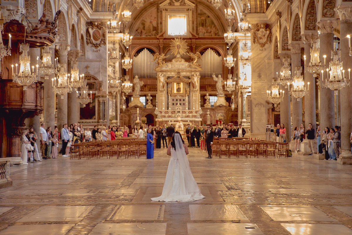 Bride waking down the aisle in S. Maria in Aracoeli