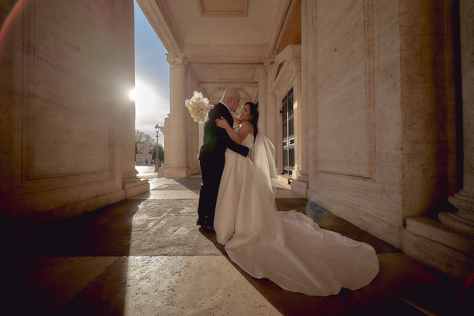 Newlyweds holding each other during photoshoot in Rome