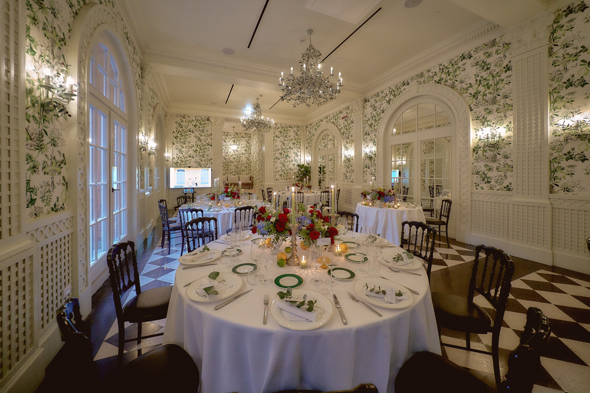 Ivy room at Hotel De La Ville, Rome set up with round tables for wedding dinner