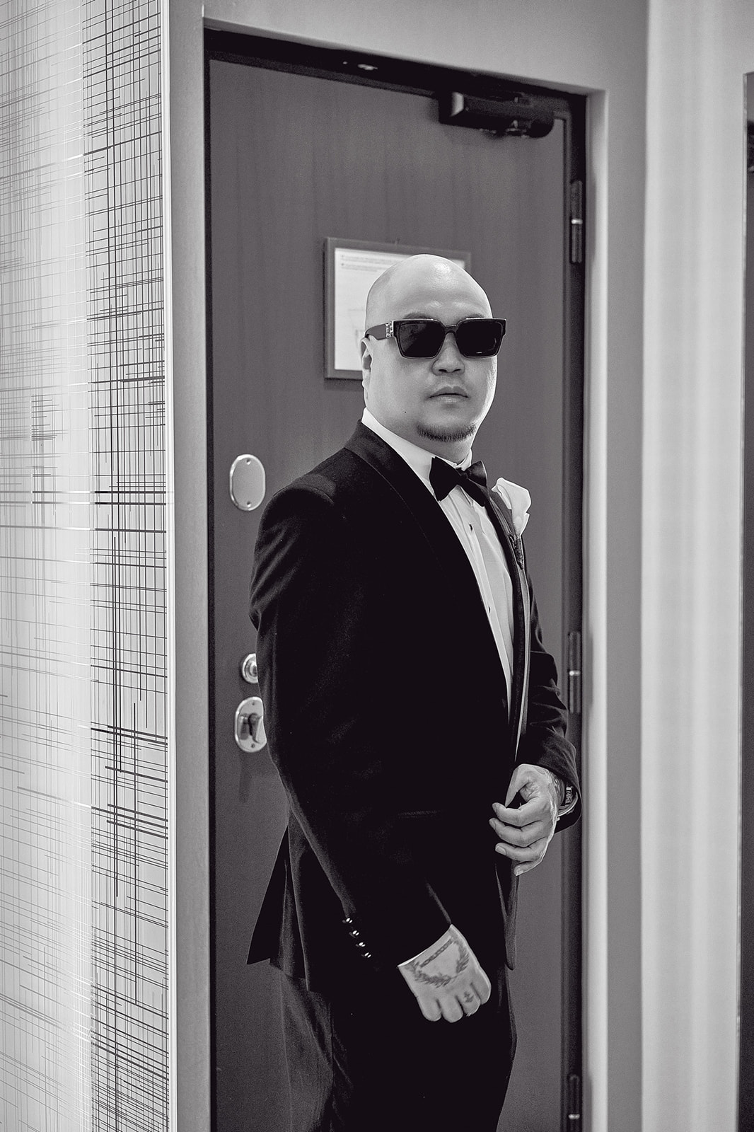 Groom portrait in black tuxedo